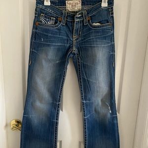 Women’s distressed bootcut jeans